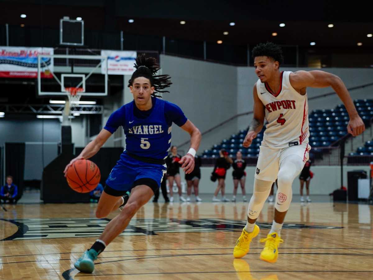 Kyran Tilley, left, threw down a highlight-reel alley-oop dunk last week for Evangel Christian (Kentucky).